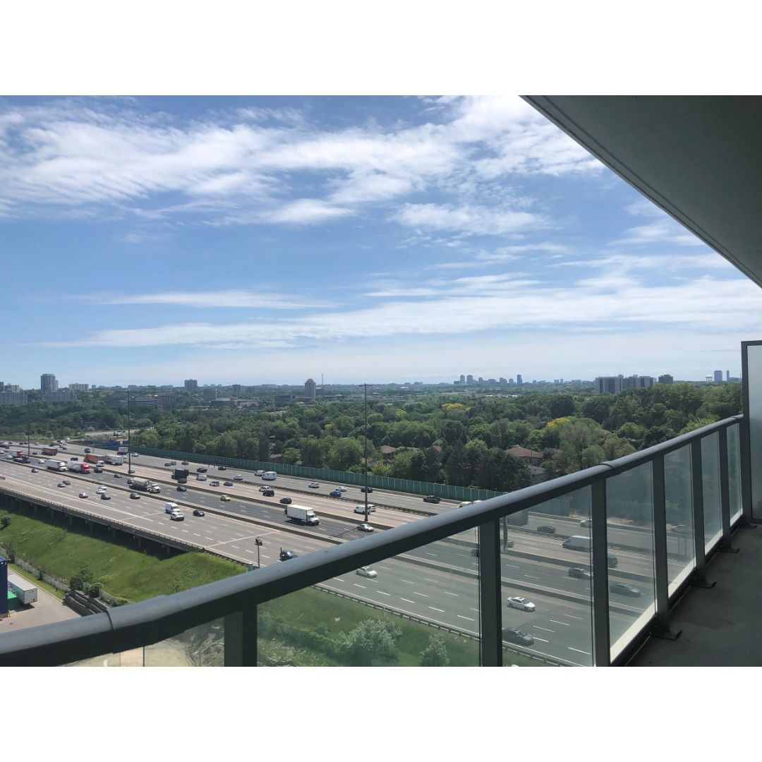 Condo bedroom with skyline view