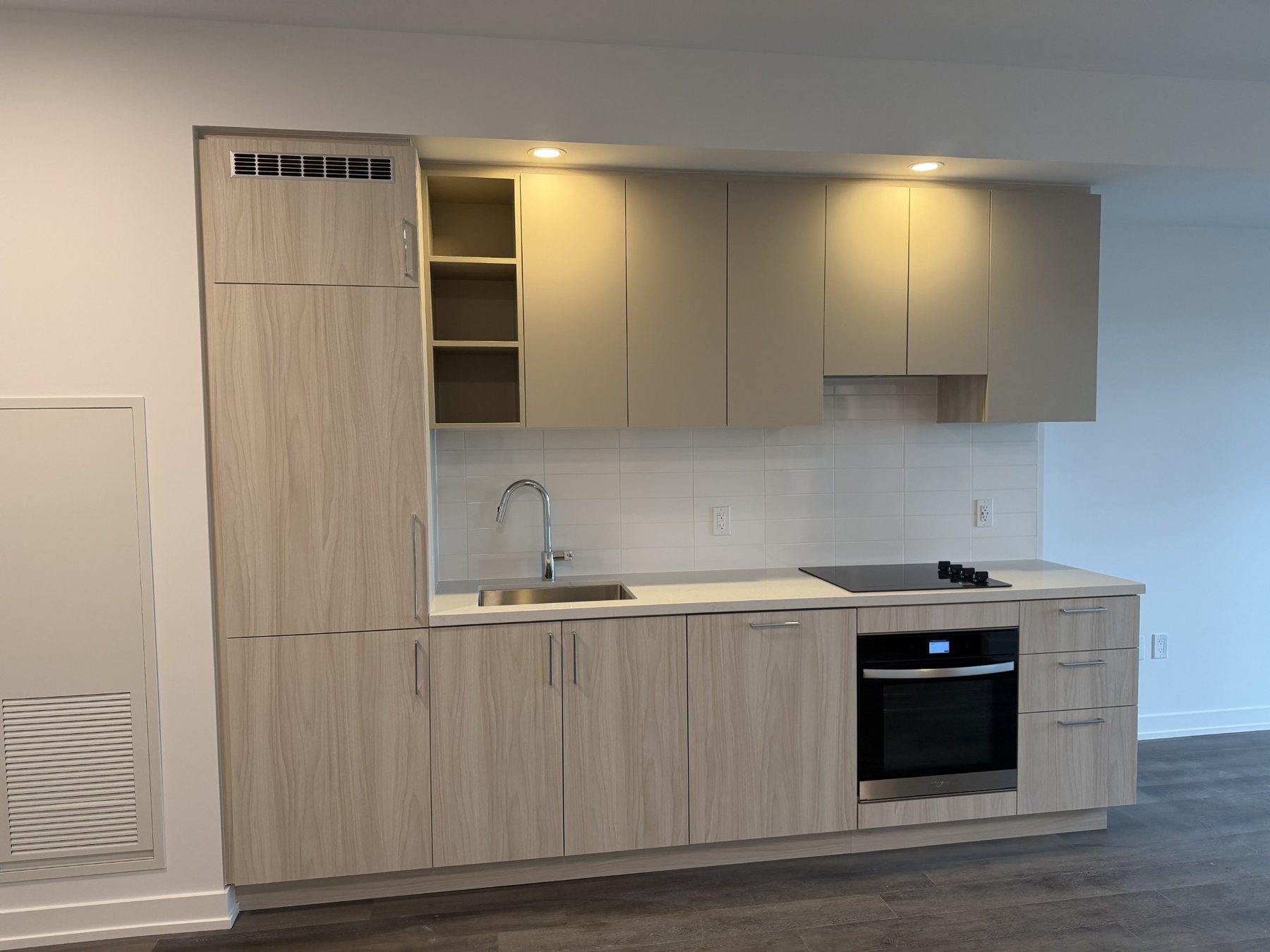 Kitchen cabinetry and integrated appliances